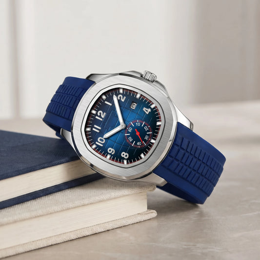 Blue strap sport watch with a blue dial on a book stack