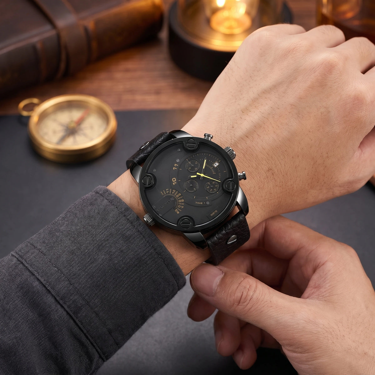 Man wearing the oversized black bolted quartz watch on his wrist