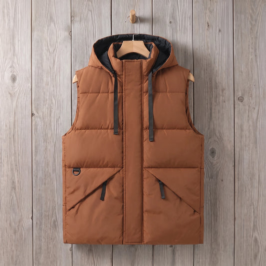 Brown drawcord hooded vest on a grey wood wall