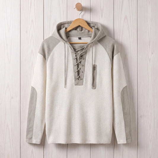 Men's white waffle knit lace-up hooded sweater hanging on a wooden hanger