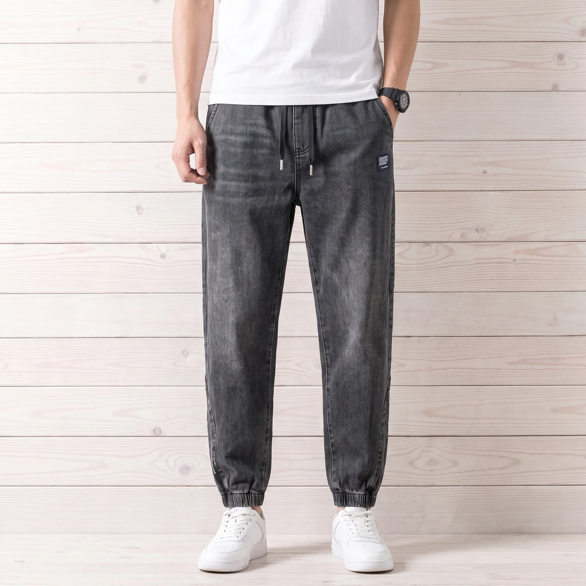 FADED DENIM JOGGERS worn
