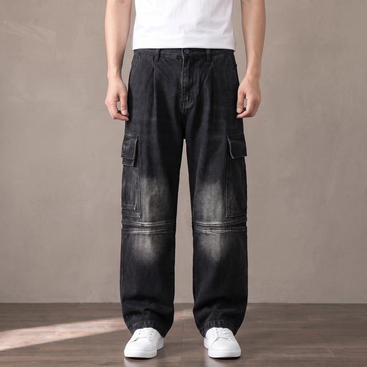 Black washed baggy cargo jeans with big thigh pockets worn with a white tee and sneakers