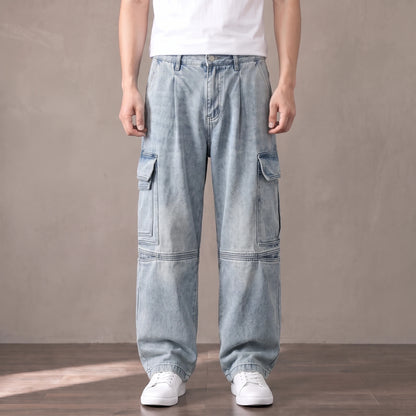 Light blue washed baggy cargo jeans with big thigh pockets worn with a white tee and sneakers