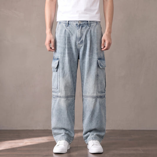 Light blue washed baggy cargo jeans with big thigh pockets worn with a white tee and sneakers