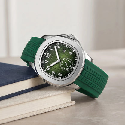 Green strap sport watch with a green dial on a book stack