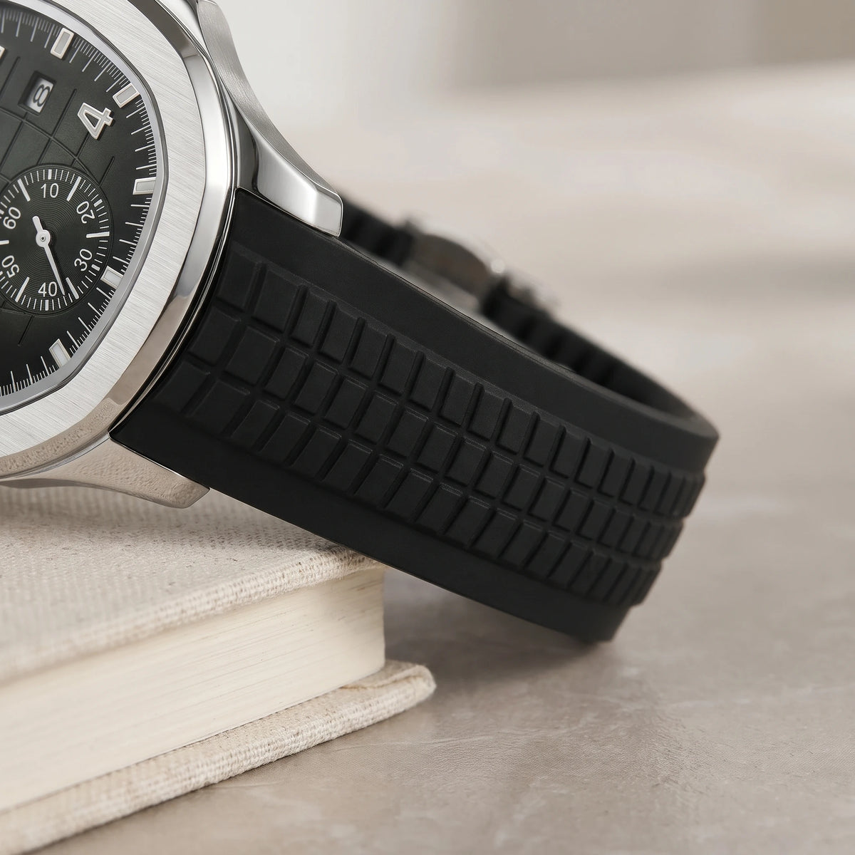 Close-up of the ribbed silicone strap and silver case