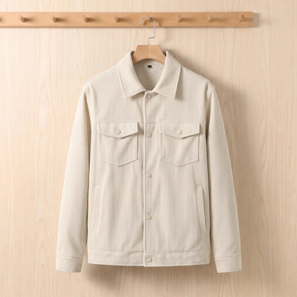 Men's beige corduroy jacket hanging on a wooden hanger