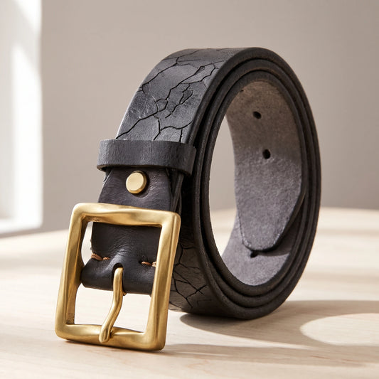 Black cowhide leather belt with a cracked pattern and a brass buckle
