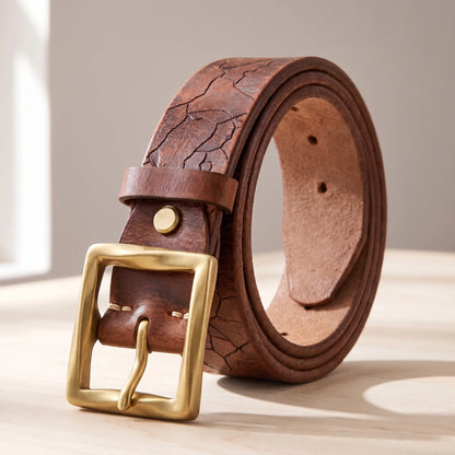 Brown cowhide leather belt with a cracked pattern and a brass buckle
