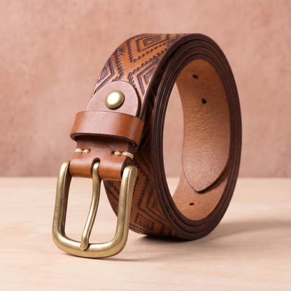 Tan leather belt with embossed diamond pattern and brass pin buckle