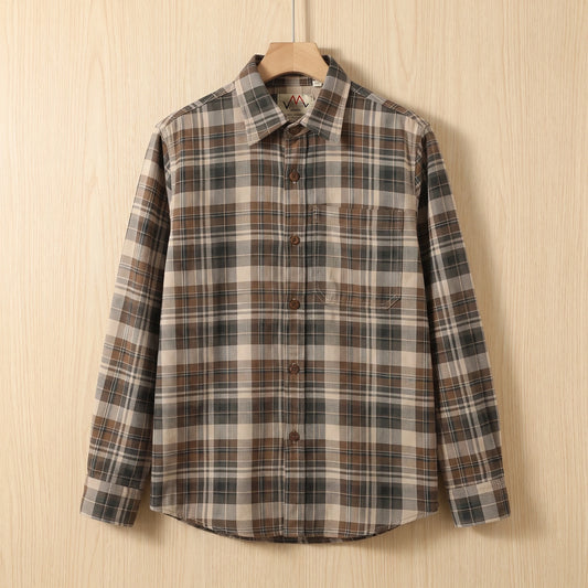 Khaki brown heavy cotton plaid shirt with a chest pocket hanging on a wooden hanger