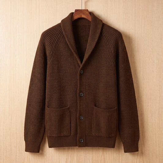 Brown ribbed knit cardigan with two patch pockets hanging on a wooden hanger