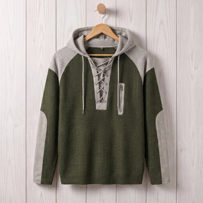 Men's green waffle knit lace-up hooded sweater hanging on a wooden hanger