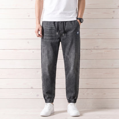 FADED DENIM JOGGERS worn
