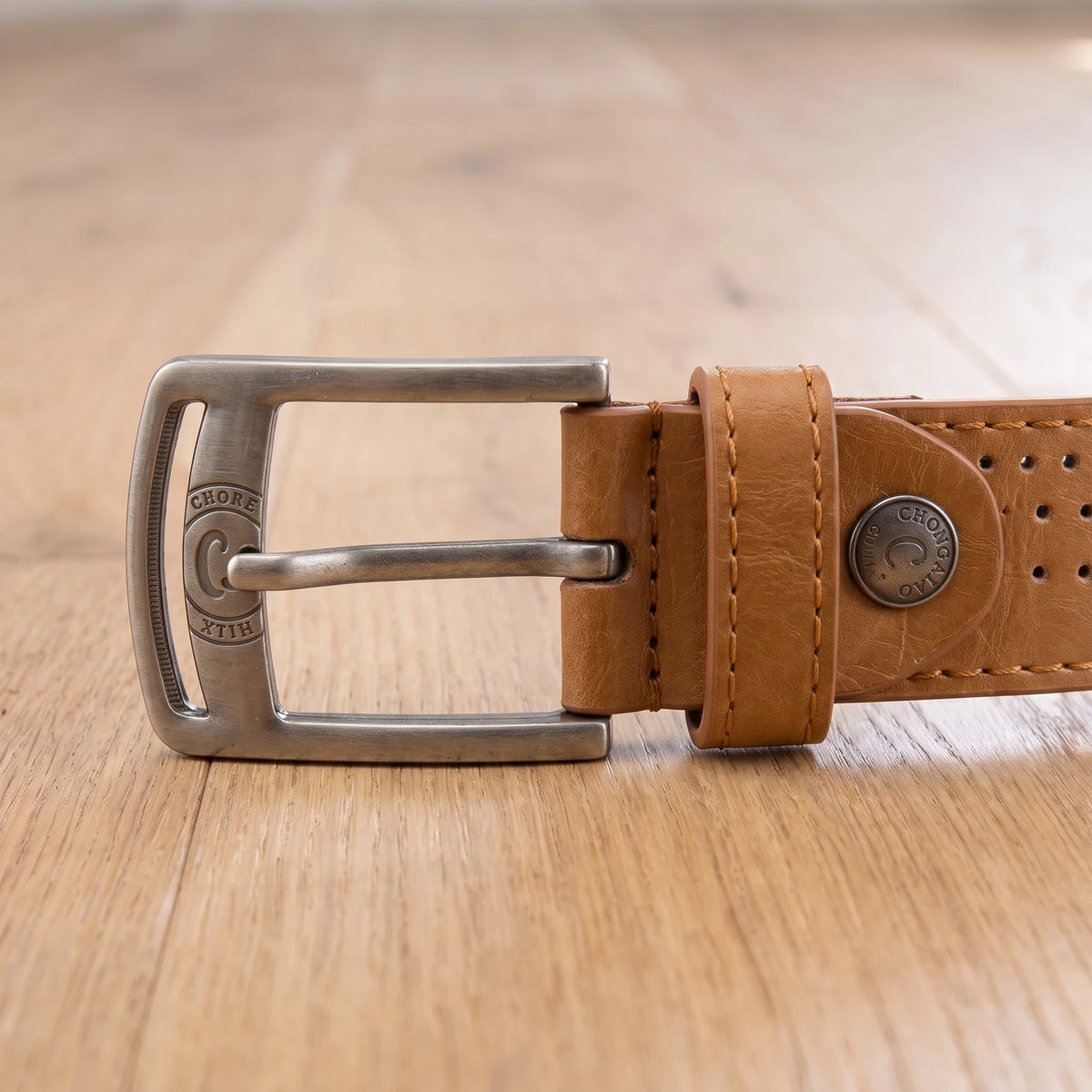 PUNCHED PIN BUCKLE BELT buckle and keeper close-up