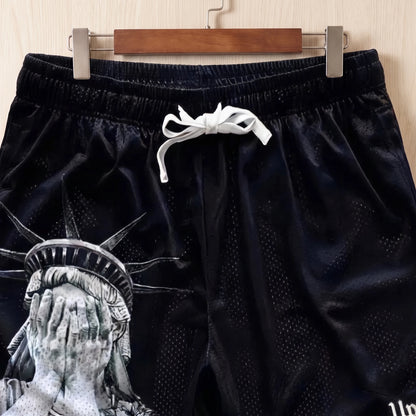 PRINTED DRAWSTRING SHORTS waistband close-up