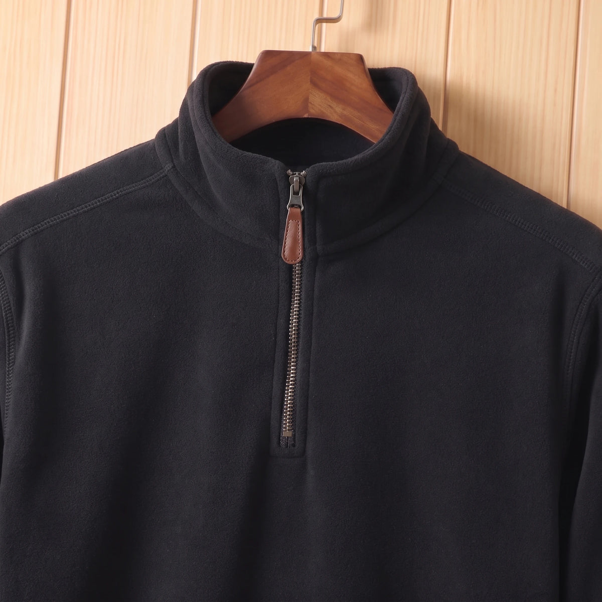 ZIP NECK FLEECE PULLOVER close-up of the stand collar and zip