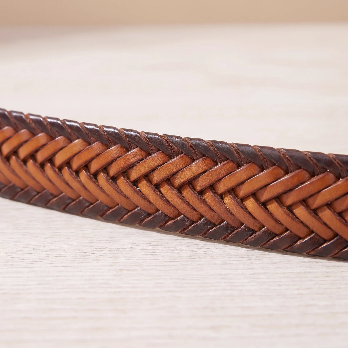 HERRINGBONE LEATHER BELT braided strap close-up